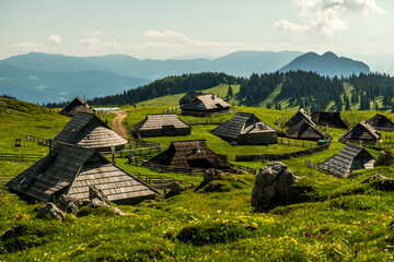 Velika Planina or Great plateau, Slovenia highlands with architecture of wooden huts and barns