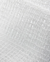 Close-up of white medical bandage Details and textures woven pattern background, Macro photo details of bandage weaving fibers, wallpapers
