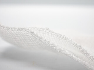 Close-up of white medical bandage Details and textures woven pattern background, Macro photo details of bandage weaving fibers, wallpapers