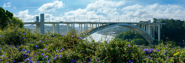 Panoramic view of the white and modern bridge over Douro (Duero) river in Porto - Ponte da Arrabida