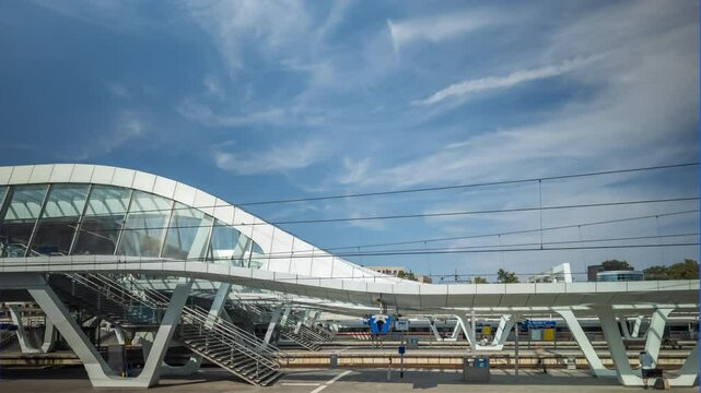 Time lapse of the central railway station in Arnhem, The Netherlands with arriving and leaving intercity trains
