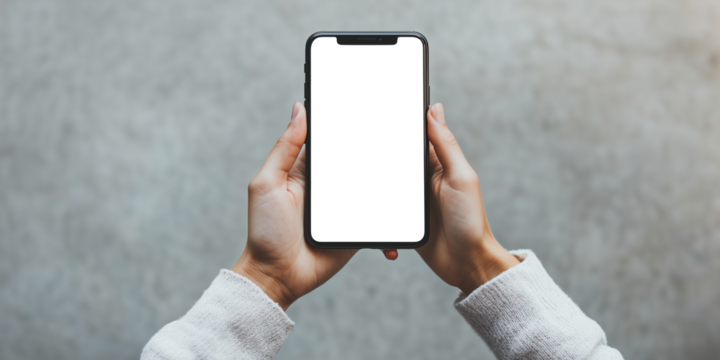 Mockup phone. Close-up photograph of hands holding a smartphone with a transparent screen. PNG image