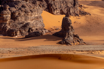 Sahara desert, sand, dunes and rocks in Algeria. Surrounding of Djanet. Place of Sahara named Moul...