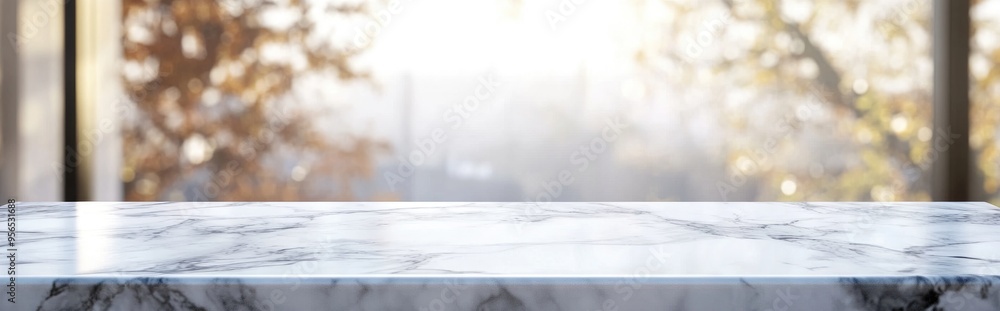 Poster white marble tabletop with a blurred abstract interior background suitable for product display or mo