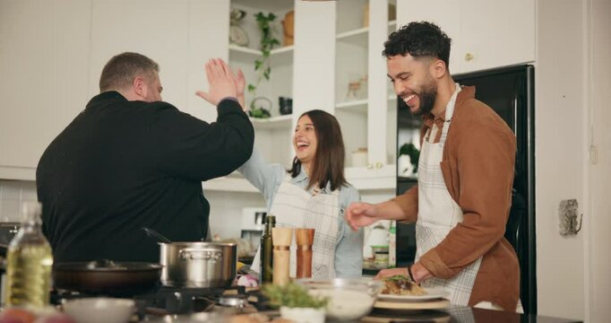 Kitchen, friends and high five for cooking class in home with food, teamwork or support learning together. Cooks, collaboration and success in catering, house skills or pride for dinner achievement