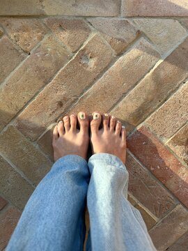 Pedicure on terracotta flooring