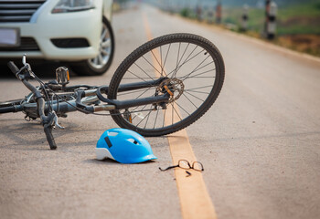 Accident car crash with bicycle on road because drunk driving.