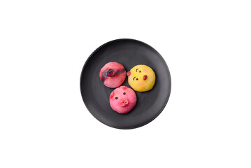 Delicious cold Japanese mochi dessert with colorful rice dough shell and fruit filling