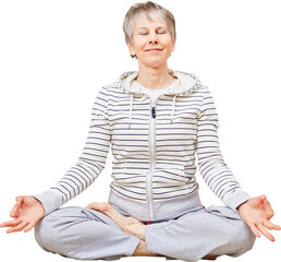 Seniorin im Lotossitz bei einer Yoga Übung
