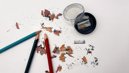 Broken graphite pencil on white background. School stationery