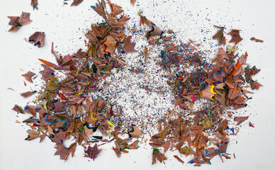 colored pencil shaving on white background. school education concept