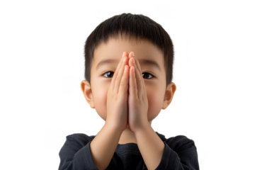 Young Asian Boy Praying with Hands Together on Transparent Background for Religious and Educational Use