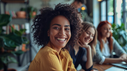 Obraz premium Smiling woman in cafe with friends diversity, friendship, and cheerful atmosphere