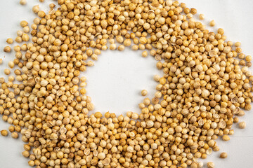 A pile of coriander seeds in a circle