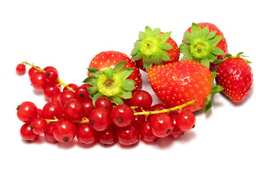 Group of ripe and delicious strawberries with red currant isolated on a white background. Background with red fruits