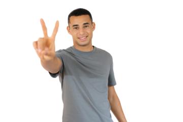 Young handsome man over isolated background smiling looking to the camera showing fingers doing victory sign over transparent background. Number two.