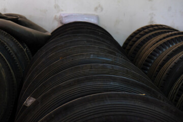 Stack shelf of car tire texture close up in garage shop