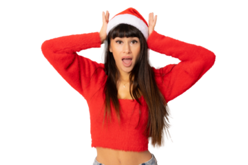 Amazed young woman in santa hat isolated over transparent background.
