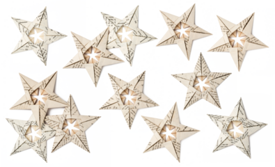 set of hand folded origami paper stars made of antique book pages isolated over a transparent background, paper craft, book art, sustainable Christmas and eco friendly holiday home decor concept, PNG