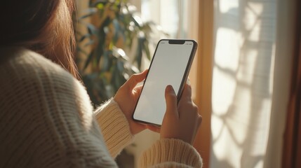 Hand using smartphone, blank white screen, simple office backdrop, high-definition, 8K