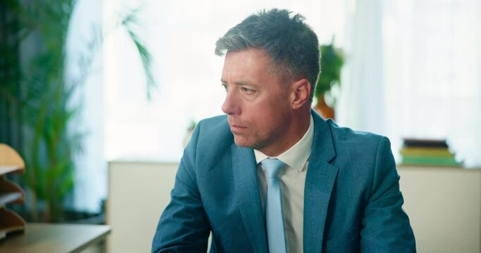 Office, thinking and mature man at desk with research, review or web analysis for business plan at digital agency. Ideas, admin or project manager at tech company with growth, development or solution