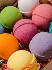 colored bath bombs, macrophotography of shower cosmetics