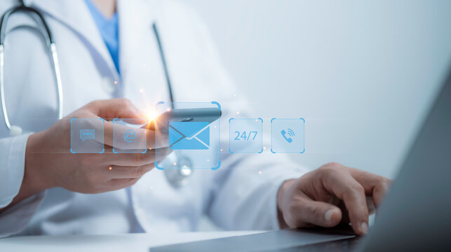 Medical worker smartphone and with virtual screen contact icons email, address, live chat, internet wifi. Contact us or Customer support Online medical service 24 hours a day