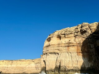 Rocky coast at Xlendi Bay of the island of Gozo, Malta, Europe
