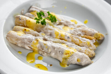 white asparagus in cream sauce fresh meal food snack on the table copy space food background rustic top view