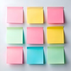 Fototapeta premium A vibrant set of blank sticky notes in various colors yellow. pink. blue. and green.