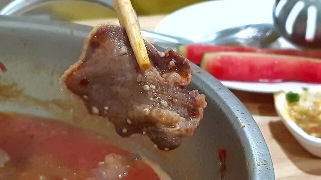 Unhygienic beef meat with tapeworm cestoda parasit egg worm inside meat at restaurant