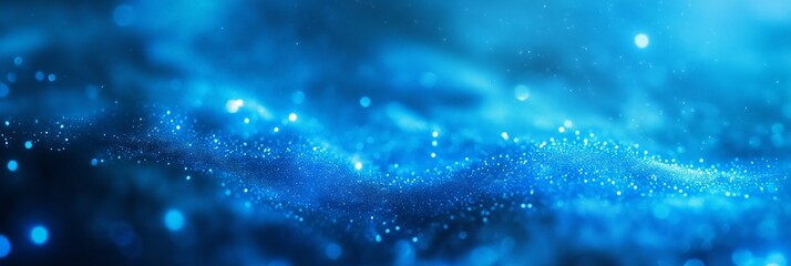 An abstract depiction featuring sparkling blue particles that resemble a glowing ocean, full of luminous energy and beauty.