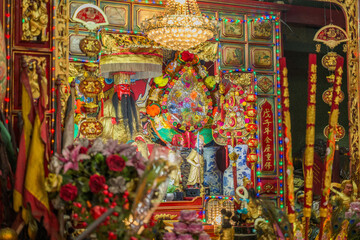 Thailand, August 11, 2024, Guan Yu Shrine (Khlong San), Intricate altar adorned with colorful...