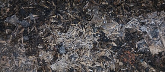 The remains of the burning that are already burnt and black