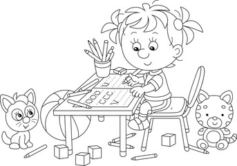 Smiling little girl writing in a copybook at her desk among funny toys in a nursery room, black and white outlined vector cartoon illustration for a coloring book page