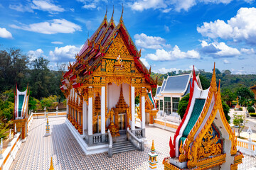 Naklejka premium Buddhist Nai Harn temple Wat on Phuket island, Thailand aerial top view. Landmark for tourism, buddhism religious tourist attraction