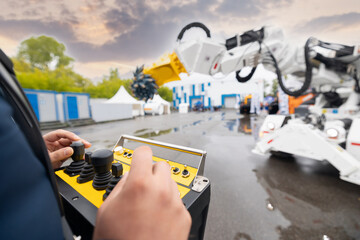 Industry operator use computer for control drilling head of mine roadheader. Concept underground...