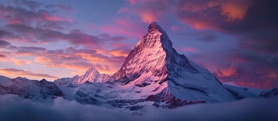 Serene Mountain Peak at Sunset   Timeless Landscape of Warm Glow and Cool Tones  This stunning timelapse showcases the changing colors of the sky as the sun dips below the rugged