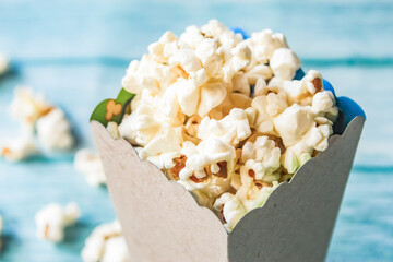 close-up of popcorn in a box on a table
