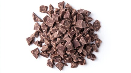 Fototapeta premium Pile chopped, milled dark chocolate isolated on white, top view 