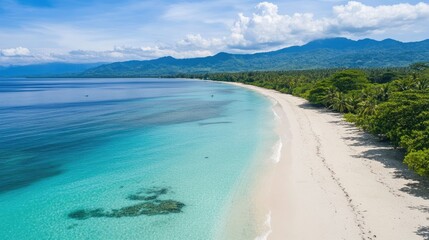 Obraz premium Scenic drone view of Santai Beach, Latuhalat, Ambon, Maluku, showing the pristine sands and sparkling waters, perfect for beach-themed backgrounds or travel ads.