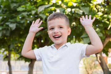 Portrait of little boy outdoors. Cute child