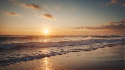 the early morning sun rising over the ocean with soft waves lapping at the shore.