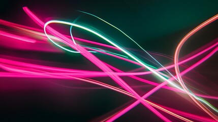 Glowing Neon Light Trails: Intersecting neon light trails in vibrant colors like pink and green, floating in a dark space, creating an abstract dance of light.
