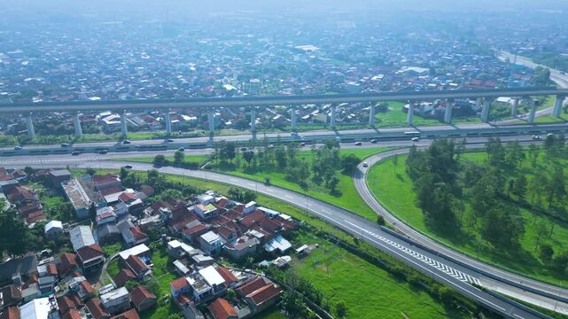 Established Aerial View of Pasir Koja Interchange, the meeting point of Soroja Toll Road, Purbaleunyi Toll Road and Jakarta-Bandung High Speed ​​Rail Line, Bandung, Indonesia