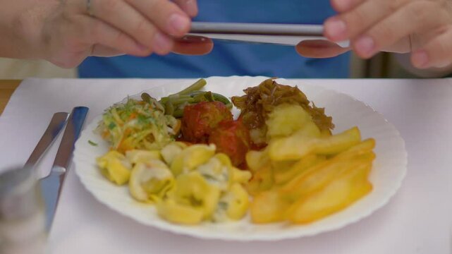 Taking picture of the dinner in the reastaurant in 4k slow motion 60fps