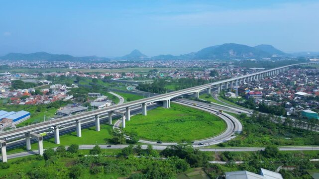 Established Aerial View of Pasir Koja Interchange, the meeting point of Soroja Toll Road, Purbaleunyi Toll Road and Jakarta-Bandung High Speed ​​Rail Line, Bandung, Indonesia