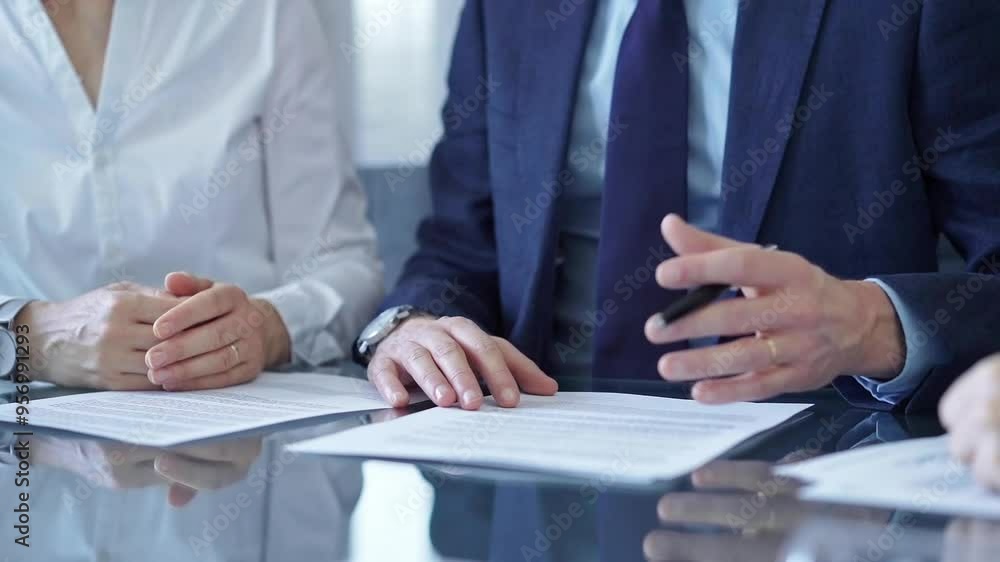 Wall mural Business people having meeting discussing contract details. Diverse group team, close up