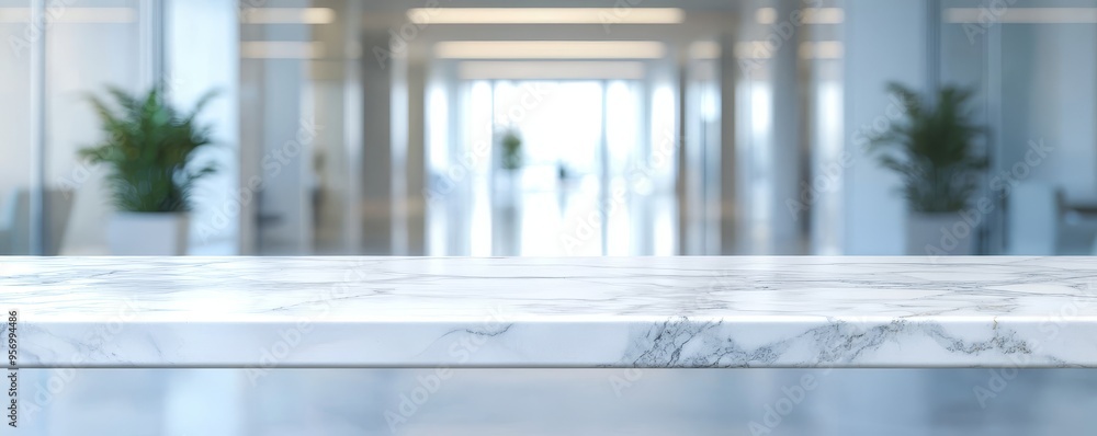 Aufkleber An abstract background of an empty white marble stone table top and a blurry glass window in an interior lobby or hallway suitable for product montage or display.