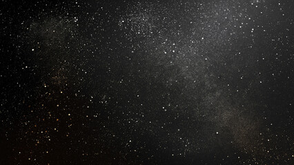 Fototapeta premium Dark background banner with stars, space, and dust that form an abstract shape.
